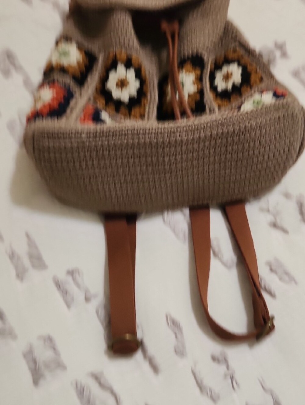 The Sak, Sayulita Crochet Flap Backpack Sand Neutral Patch, Medium - Picture 13 of 15